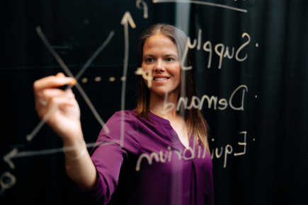 Teacher using lightboard to instruct students